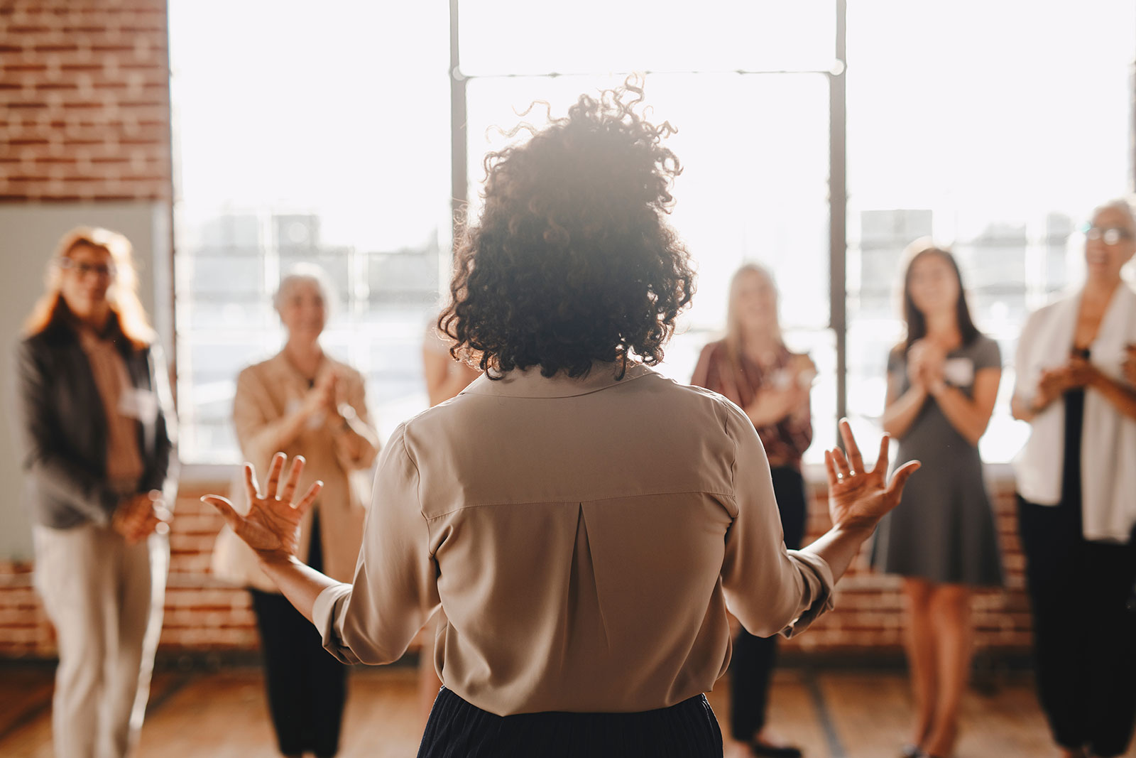 woman addressing staff photo